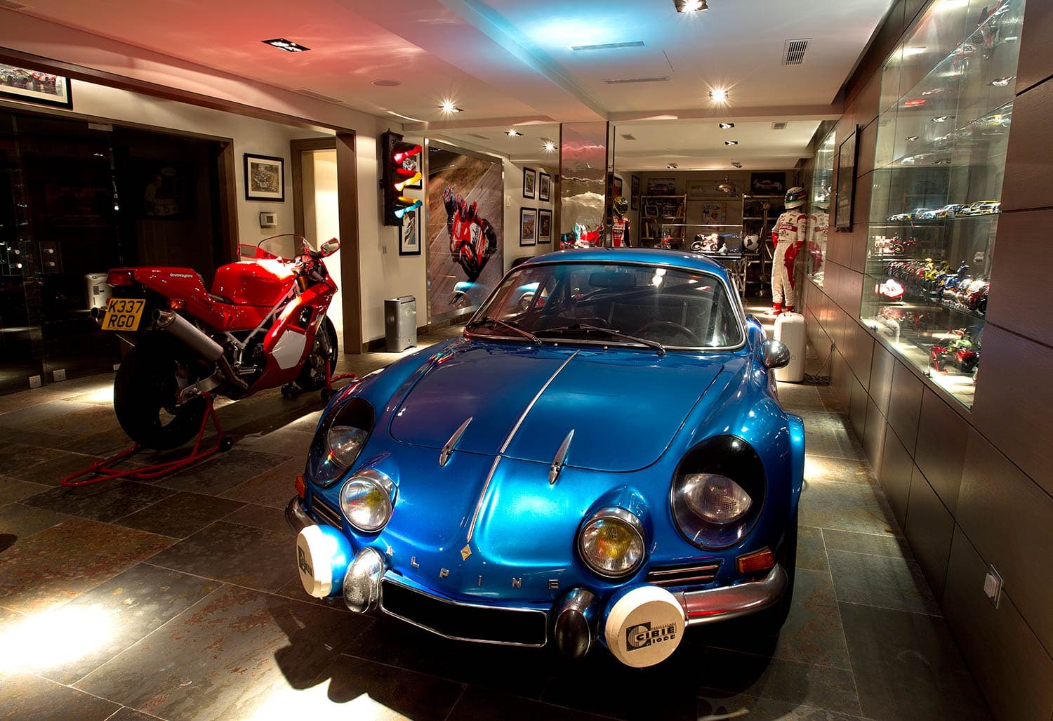 Bespoke luxury garage with classic car display — Sonia Korn